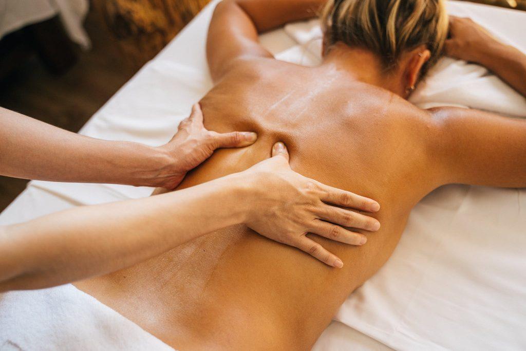 a-person-massaging-a-clients-bare-back-1024x683.jpeg